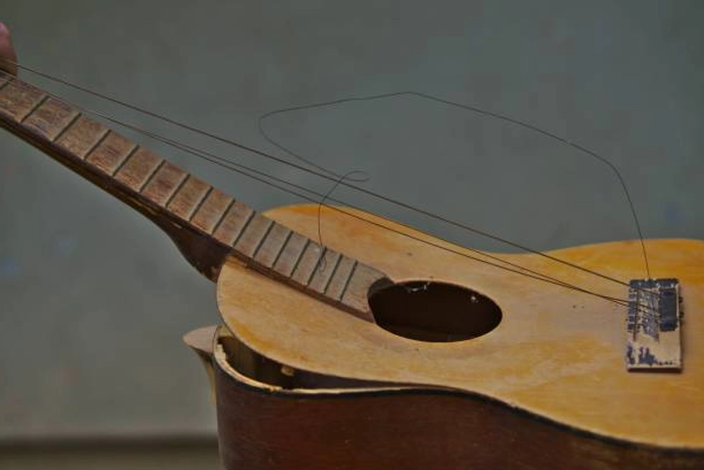 Acoustic Guitar Collapse