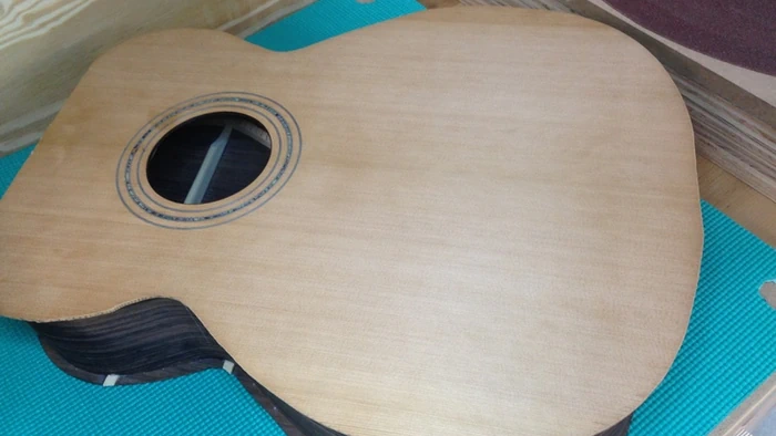 Cozad Guitars - Gluing on Soundboard