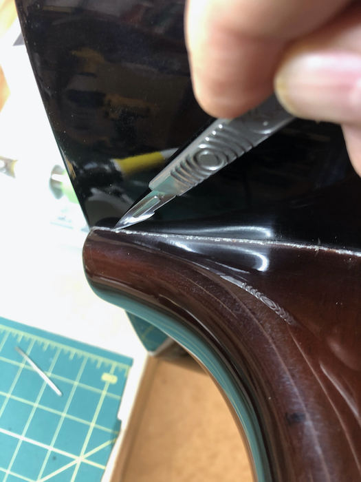 Scribing the lacquer with a scalpel