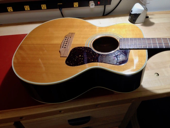 1975 Guild F-212 on the bench
